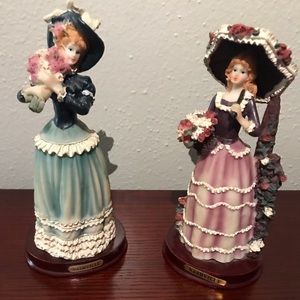 D-13). TWO Nashville LADY Figurines